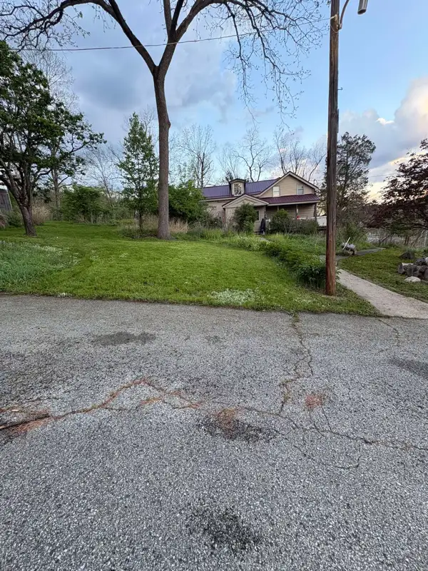 Front yard mowed clean and tidy after Fordeley Mowing service — South Hills PA